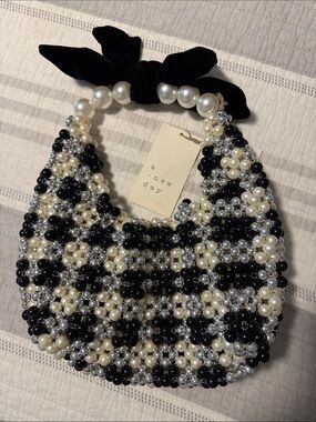 A new day Black, Pearl & Silver Beaded velvet Bow-Top Handbag